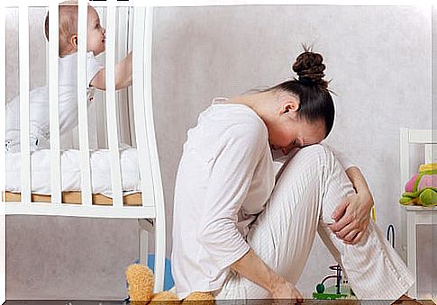 Woman turning her back to her baby