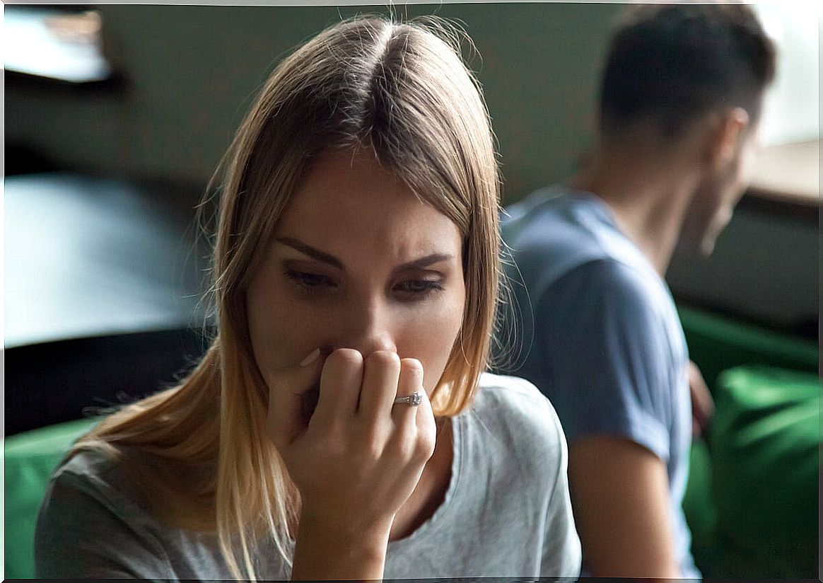 Worried woman arguing with her partner