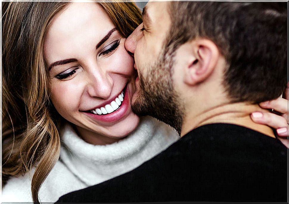 Couple kissing after saying "I love you"