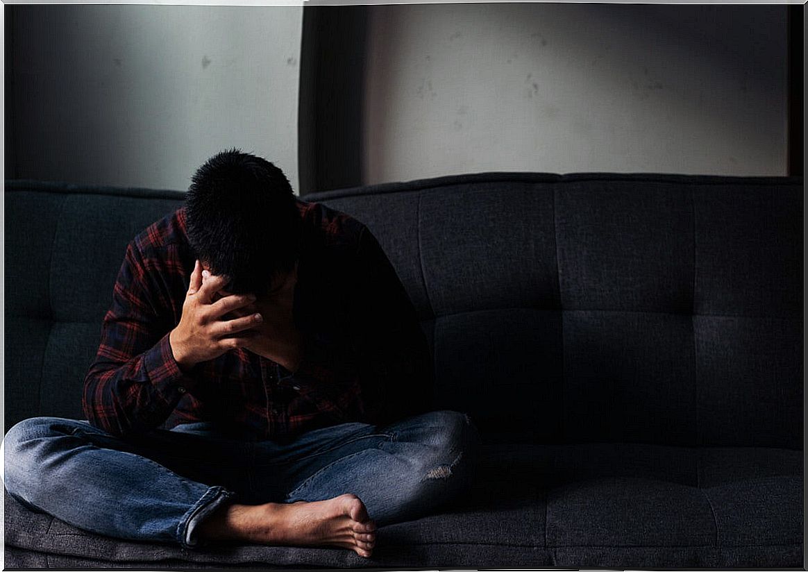 Man sitting on sofa