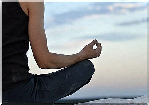 Person meditating in a silent retreat