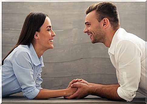 Couple talking face to face to represent decision making in the couple