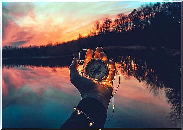 Hand with compass