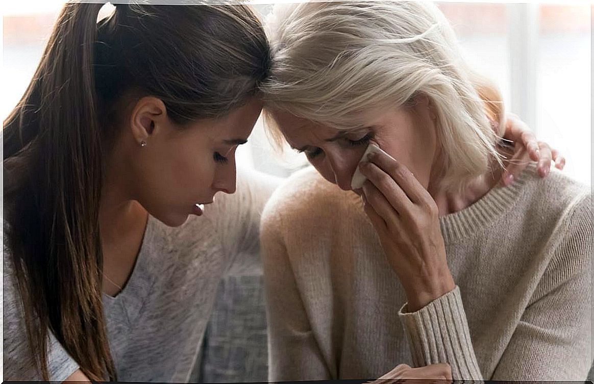 daughter supporting her mother symbolizing how to comfort with words