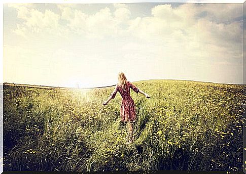 Woman walking in the field