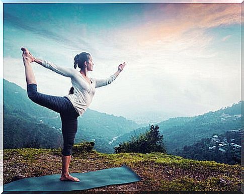 Woman practicing a new yoga posture with her body