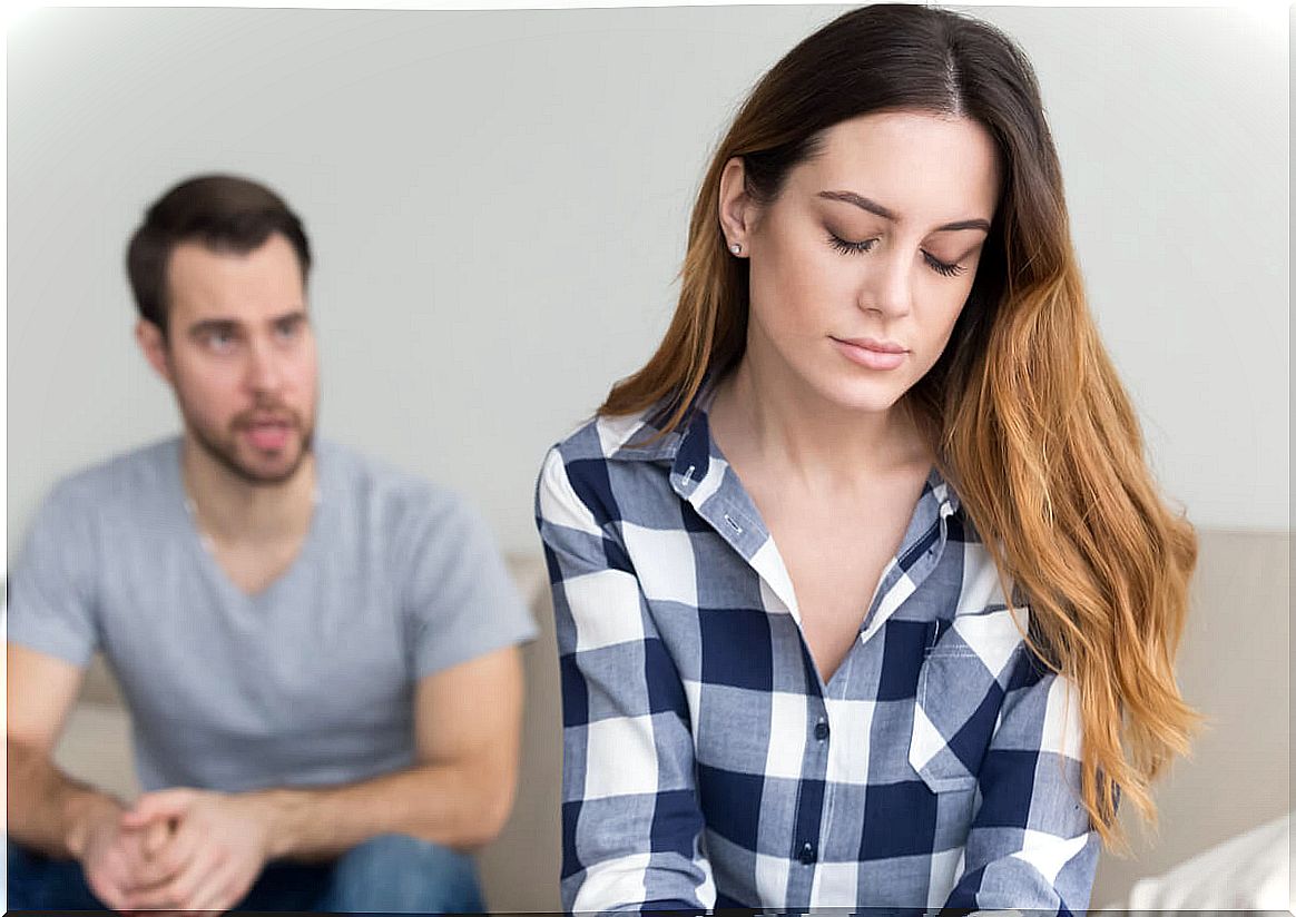 Sad woman because her partner speaks badly to her