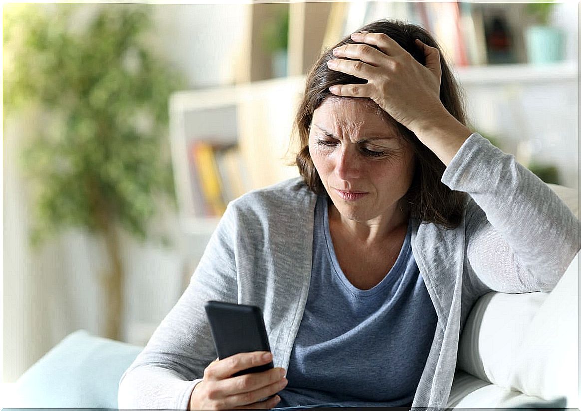 Woman reading news on mobile