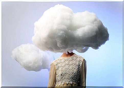 Woman with a cloud on her head representing cognitive biases