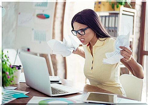 Stressed woman from overinformation at work