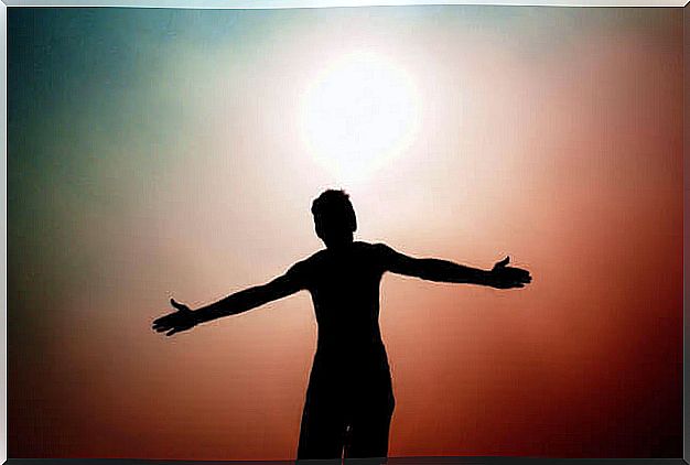 man with outstretched arms representing personality types according to Erich Fromm