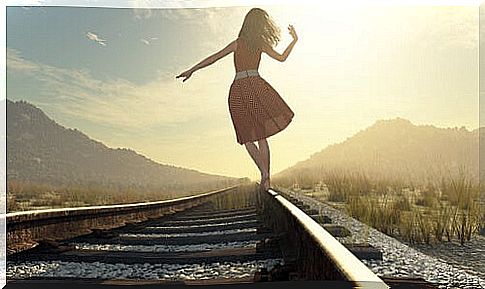 Woman walking to the top of the stock scale