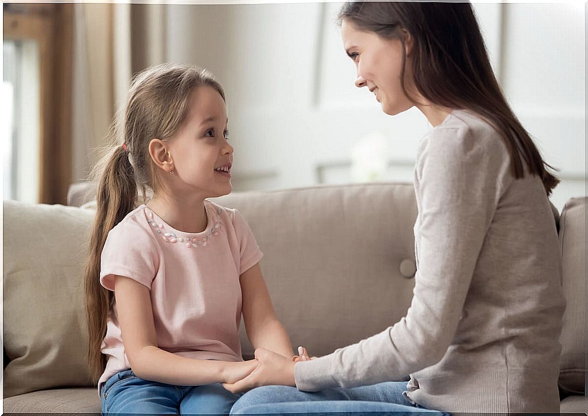 Little girl talking to her mother