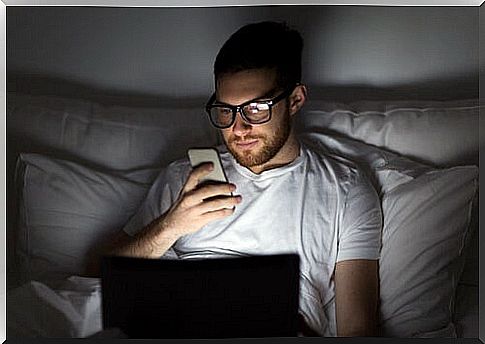 Man with internet romance using mobile