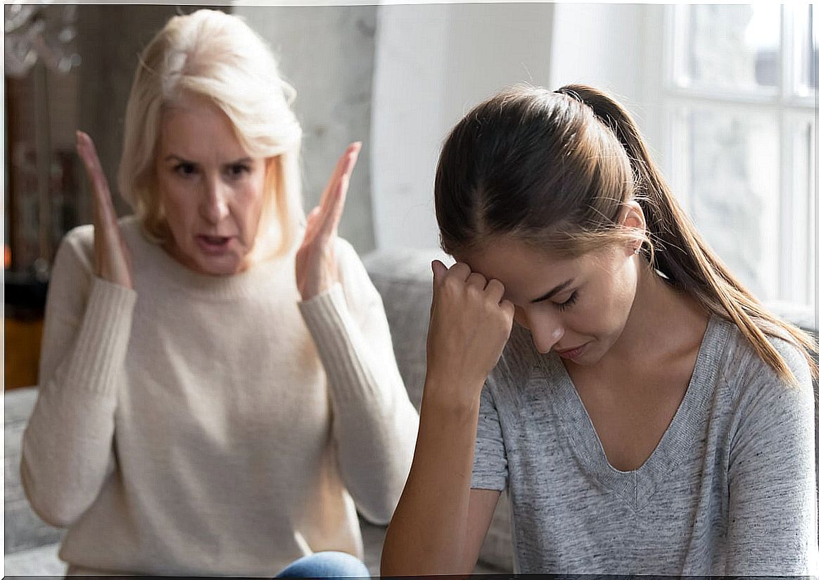 Angry adult mother and daughter symbolizing when you can't say what you think to your family