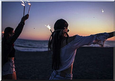 Teens partying on the beach